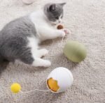 Interactive Cat Egg Toy – Rolling Puzzle Ball with Dangling Teasers - Image 2